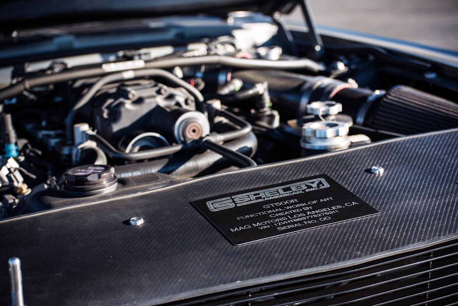 MAG Motors GT500R serial plaque on a carbon engine cover