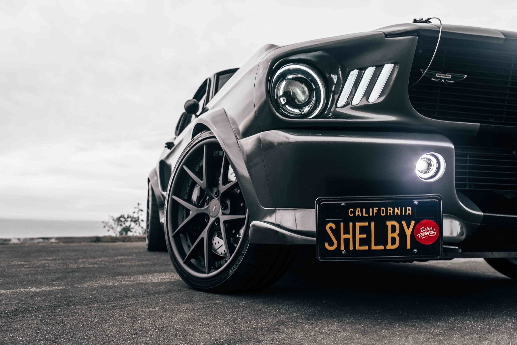 Grey MAGStang GT500R on a coastal road