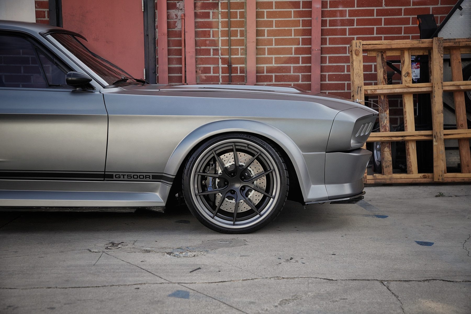 MAGStang rear three-quarter with custom diffuser and quad exhaust
